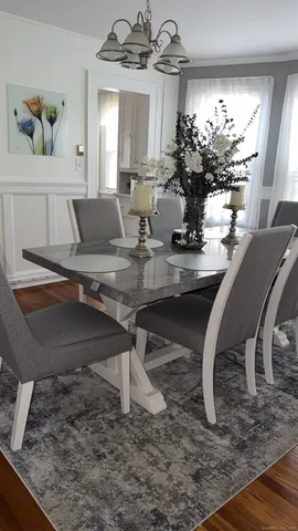 a view of a dining room with furniture