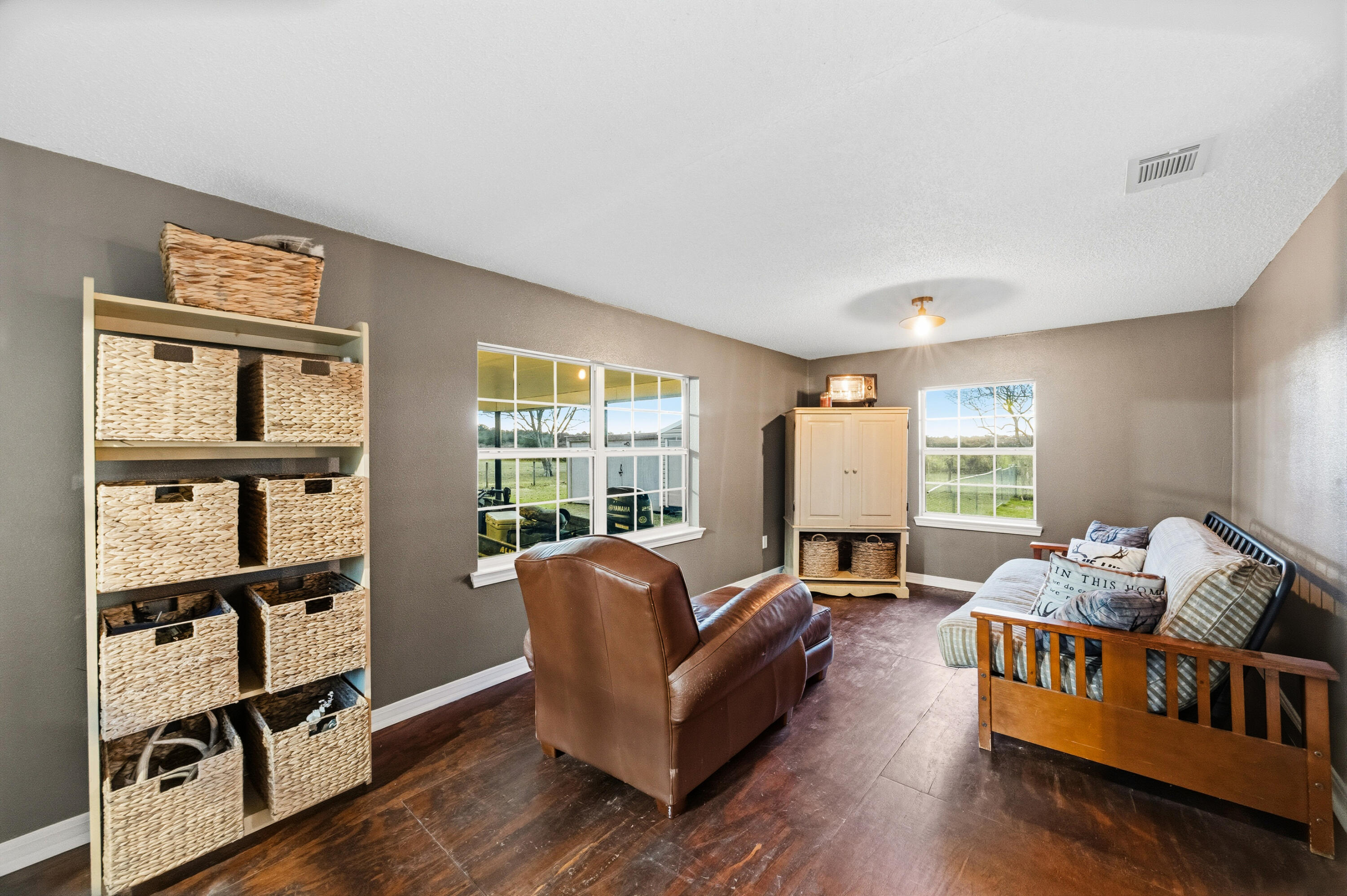 4398 Cooper Lane Holt, FL 32564 - Photo 21 of 53 a living room with furniture and a window