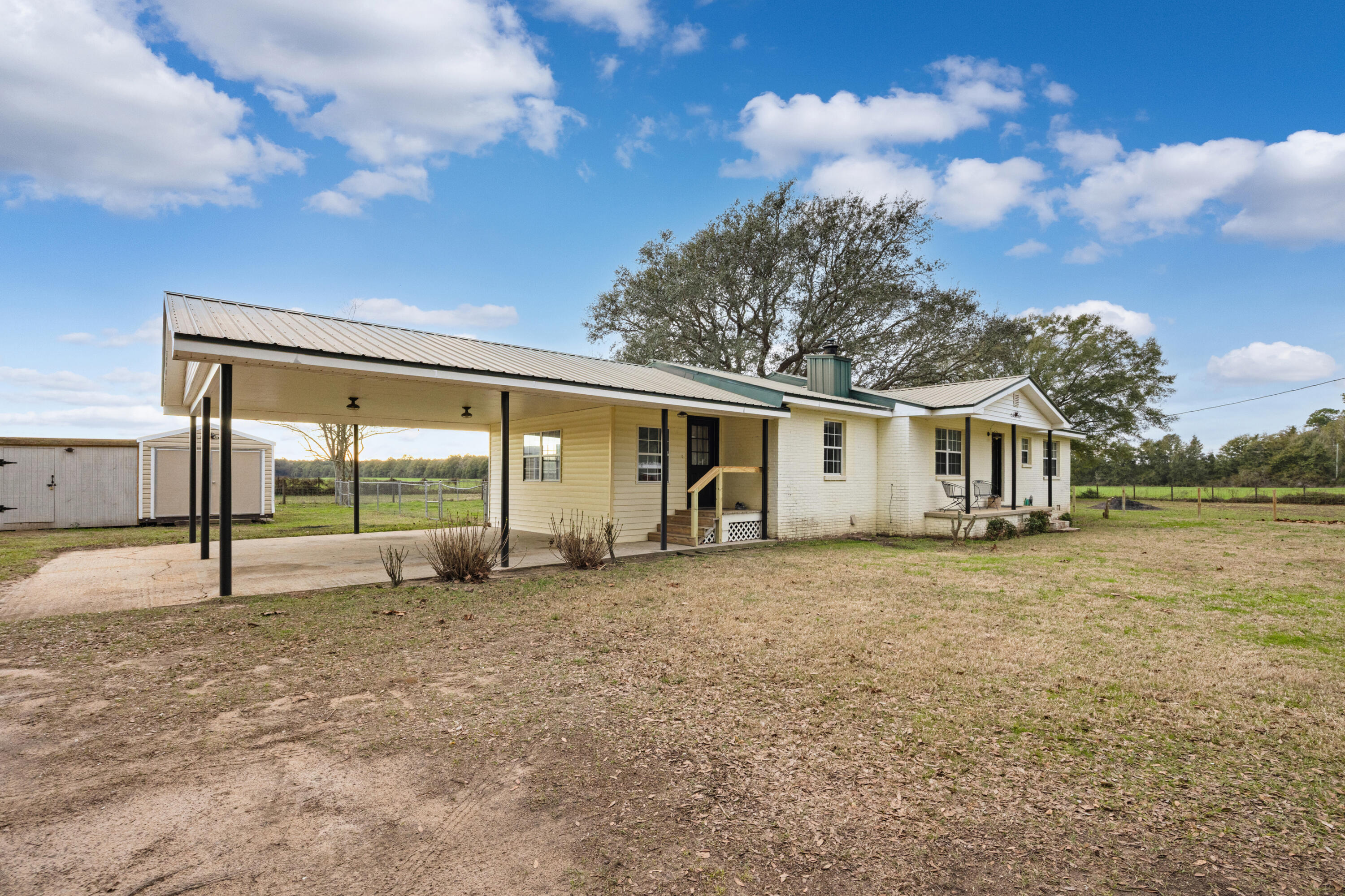 4398 Cooper Lane Holt, FL 32564 - Photo 4 of 53 a view of a house with a backyard