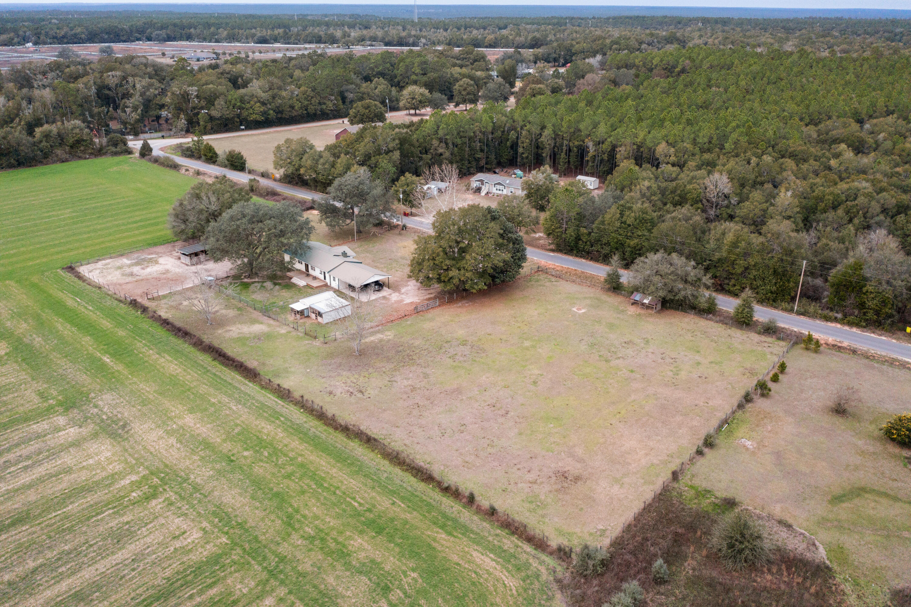 4398 Cooper Lane Holt, FL 32564 - Photo 49 of 53 an aerial view of a house with a yard