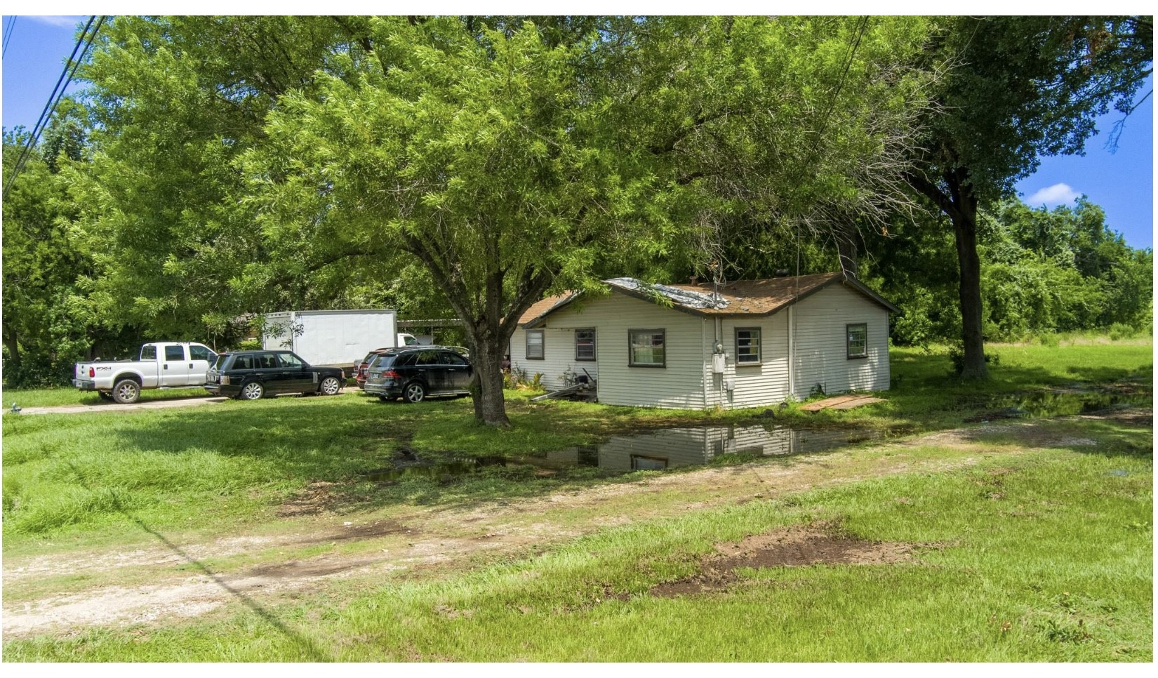 3240 Brownie Campbell Road Houston, TX 77086 - Photo 14 of 19 a house view with a garden space