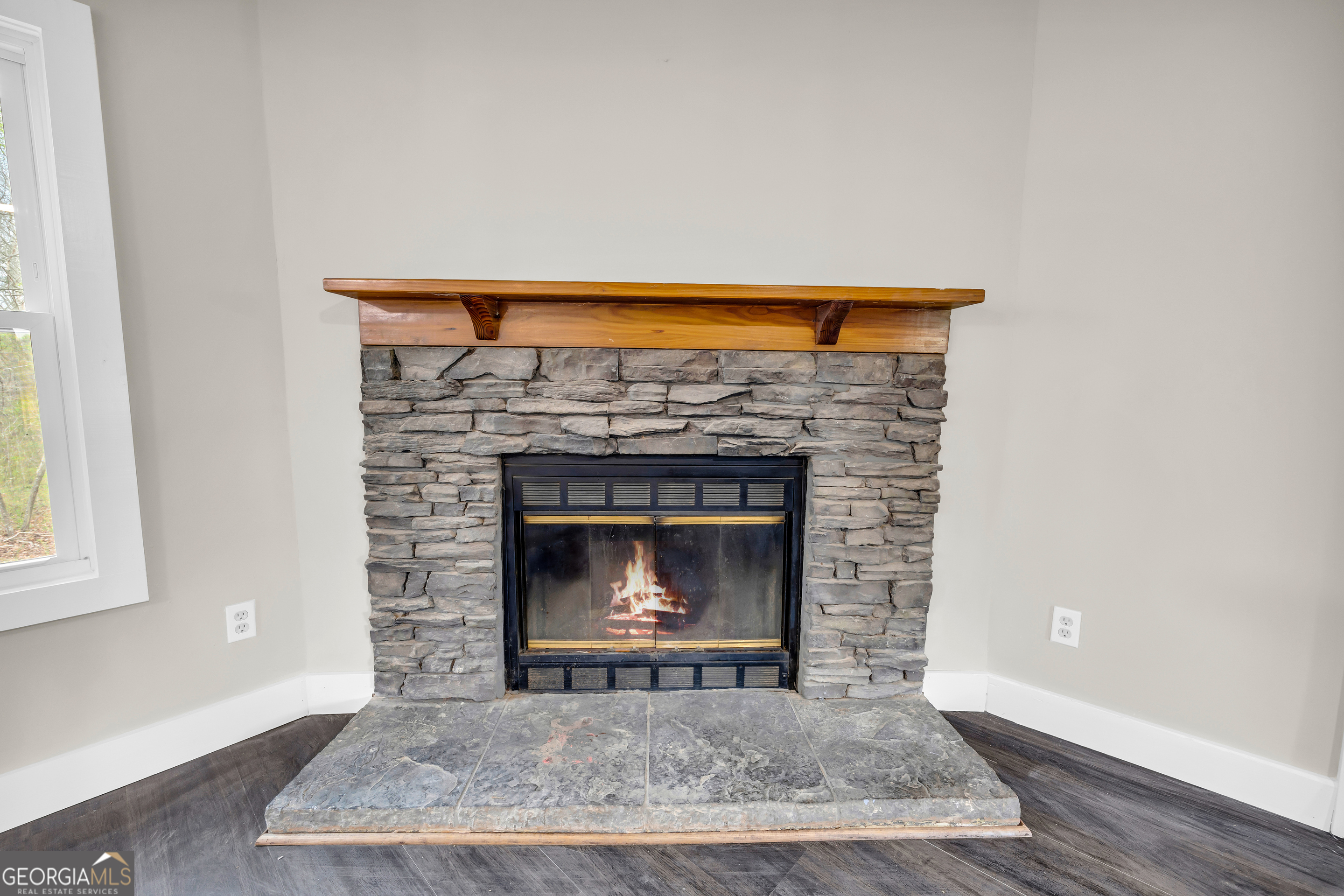 5620 Mize Road Toccoa, GA 30577 - Photo 11 of 37 a living room with a fireplace