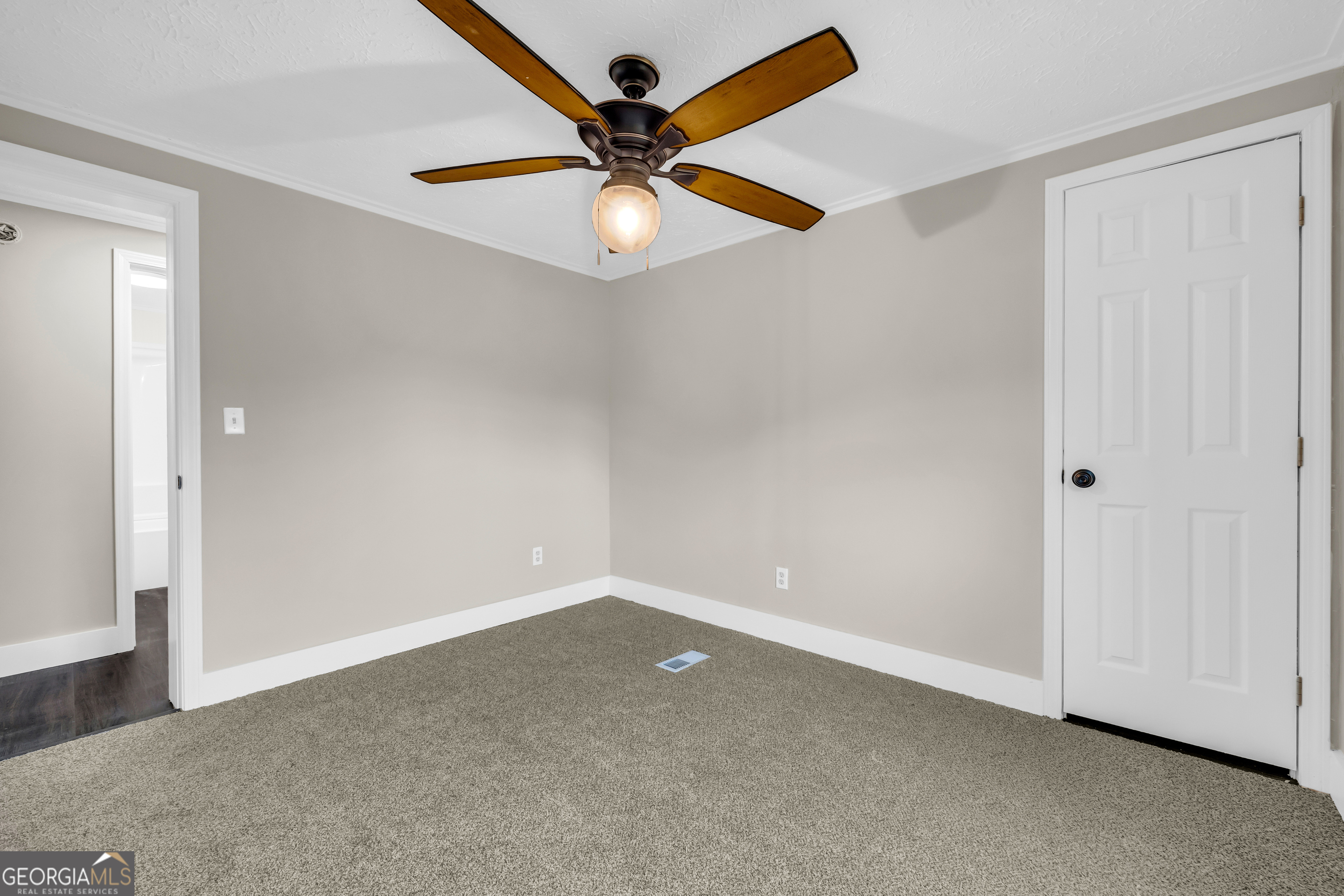 5620 Mize Road Toccoa, GA 30577 - Photo 14 of 37 an empty room with closet and fan