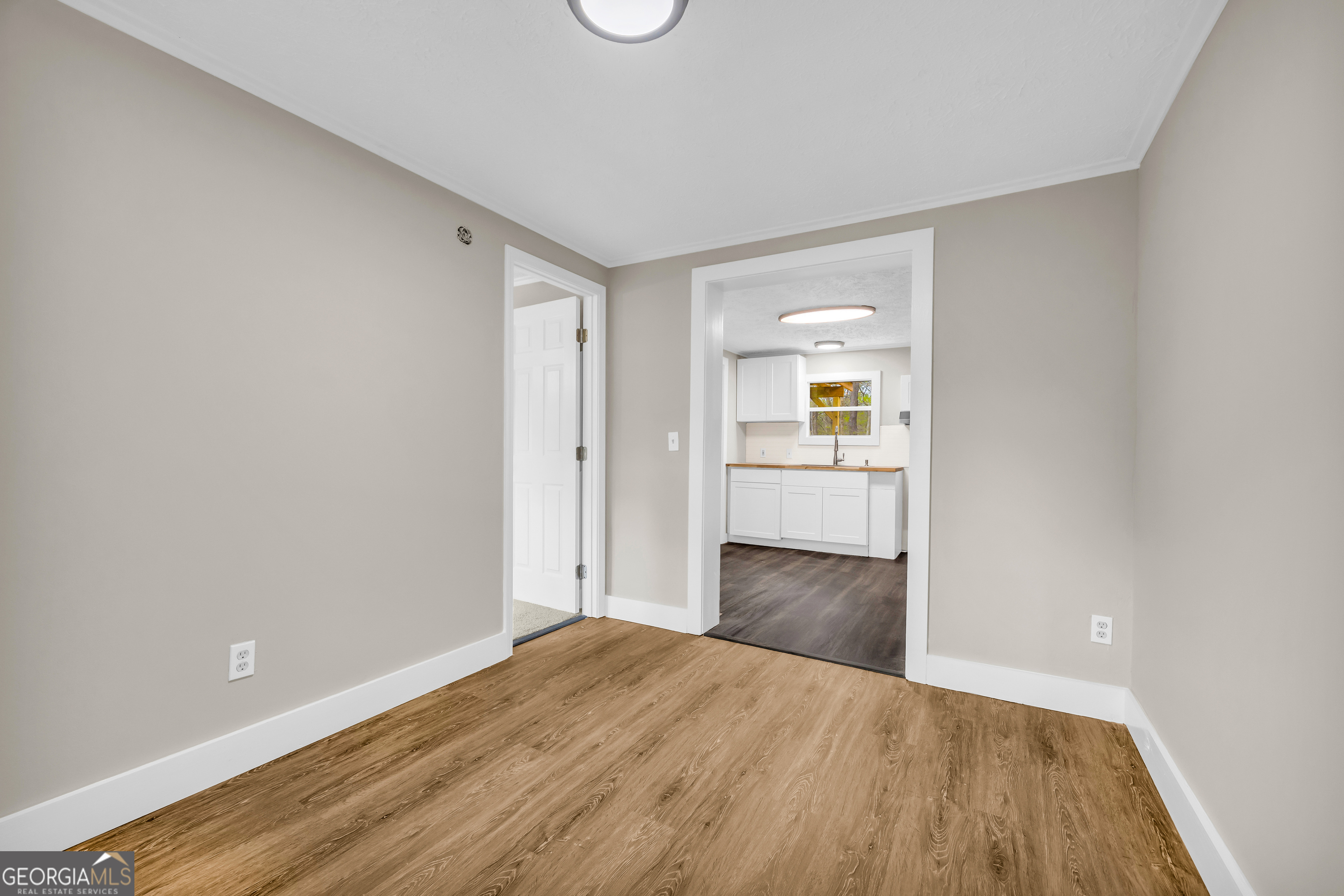 5620 Mize Road Toccoa, GA 30577 - Photo 27 of 37 a view of wooden floor and windows in a room