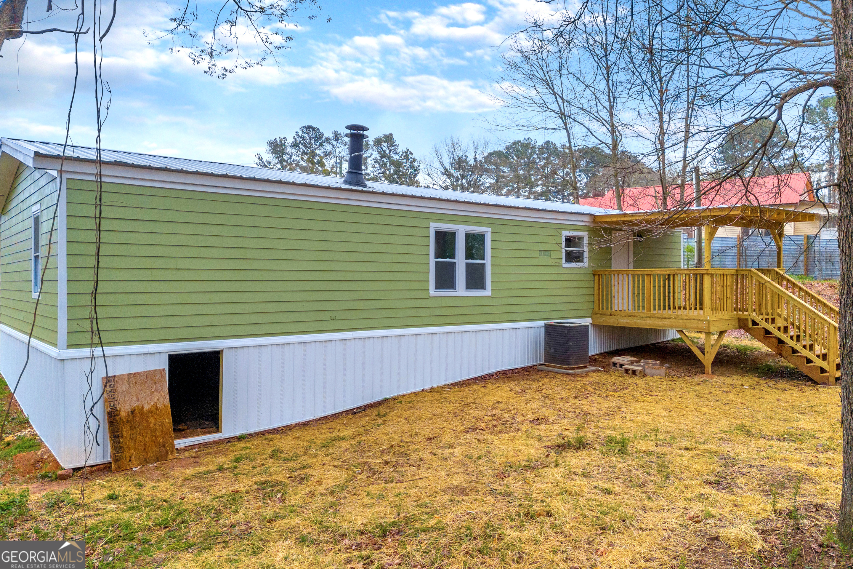 5620 Mize Road Toccoa, GA 30577 - Photo 37 of 37 a backyard of a house with yard and staircase