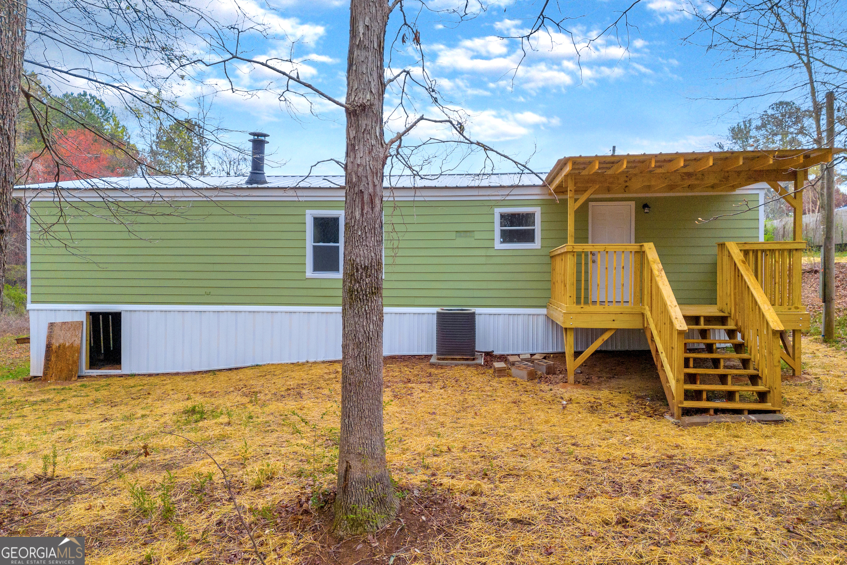 5620 Mize Road Toccoa, GA 30577 - Photo 5 of 37 a view of a house with a backyard