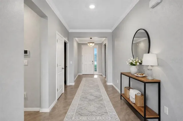 a view of a hallway view with staircase