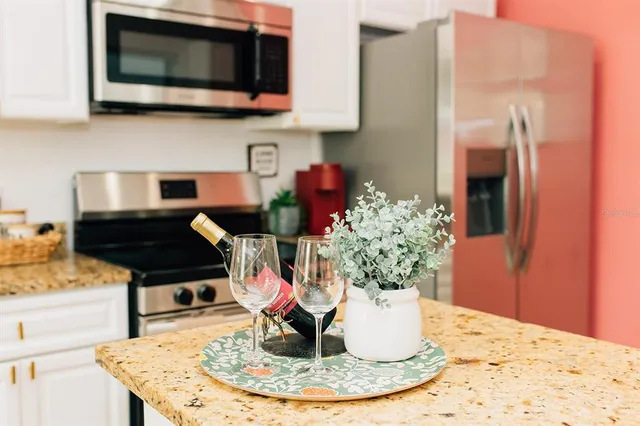 a vase of flowers sitting on a table