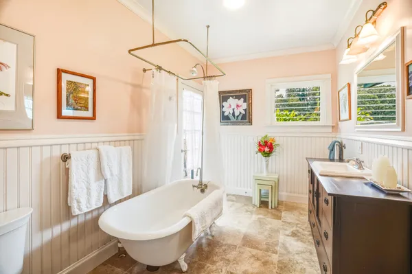 a bathroom with a sink a toilet and a bathtub