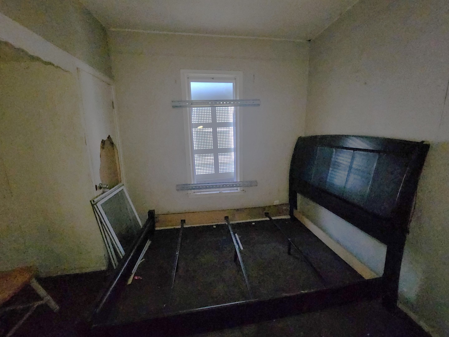 310 West 108th Place Chicago, IL 60628 - Photo 8 of 12 a room with wooden floor and staircase