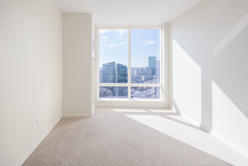 1 Franklin Street, Unit 3903 Boston, MA 02110 - Photo 9 of 26 a view of an empty room with a window