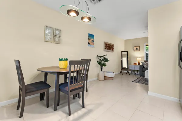 a view of a dining room with furniture