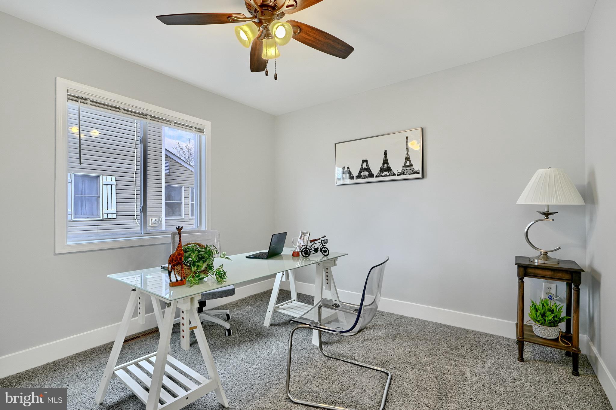 709 Fuselage Avenue Baltimore, MD 21221 - Photo 21 of 36 a dining room with furniture and window