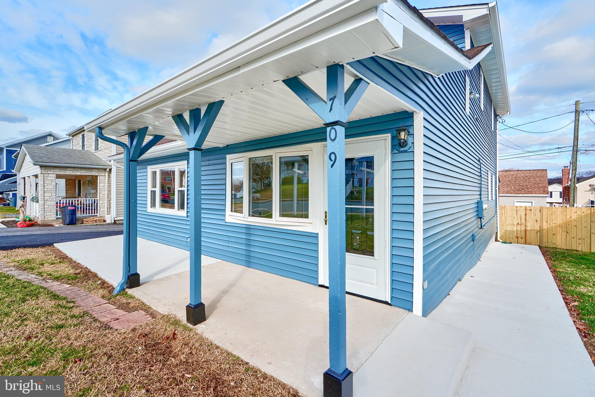 709 Fuselage Avenue Baltimore, MD 21221 - Photo 3 of 36 a view of a house with wooden fence
