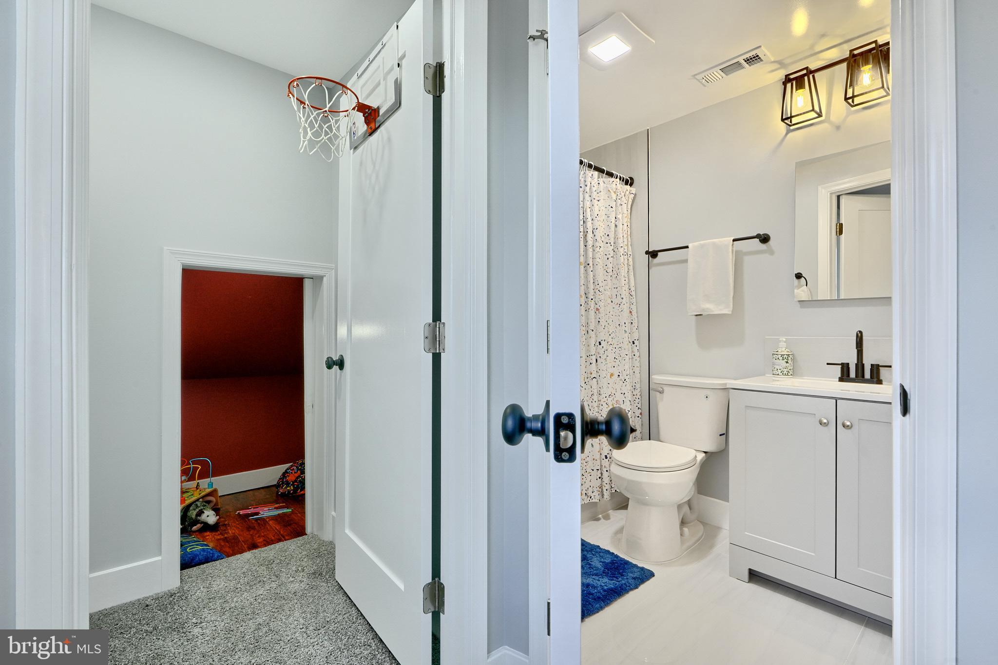 709 Fuselage Avenue Baltimore, MD 21221 - Photo 31 of 36 a bathroom with a sink a toilet and shower