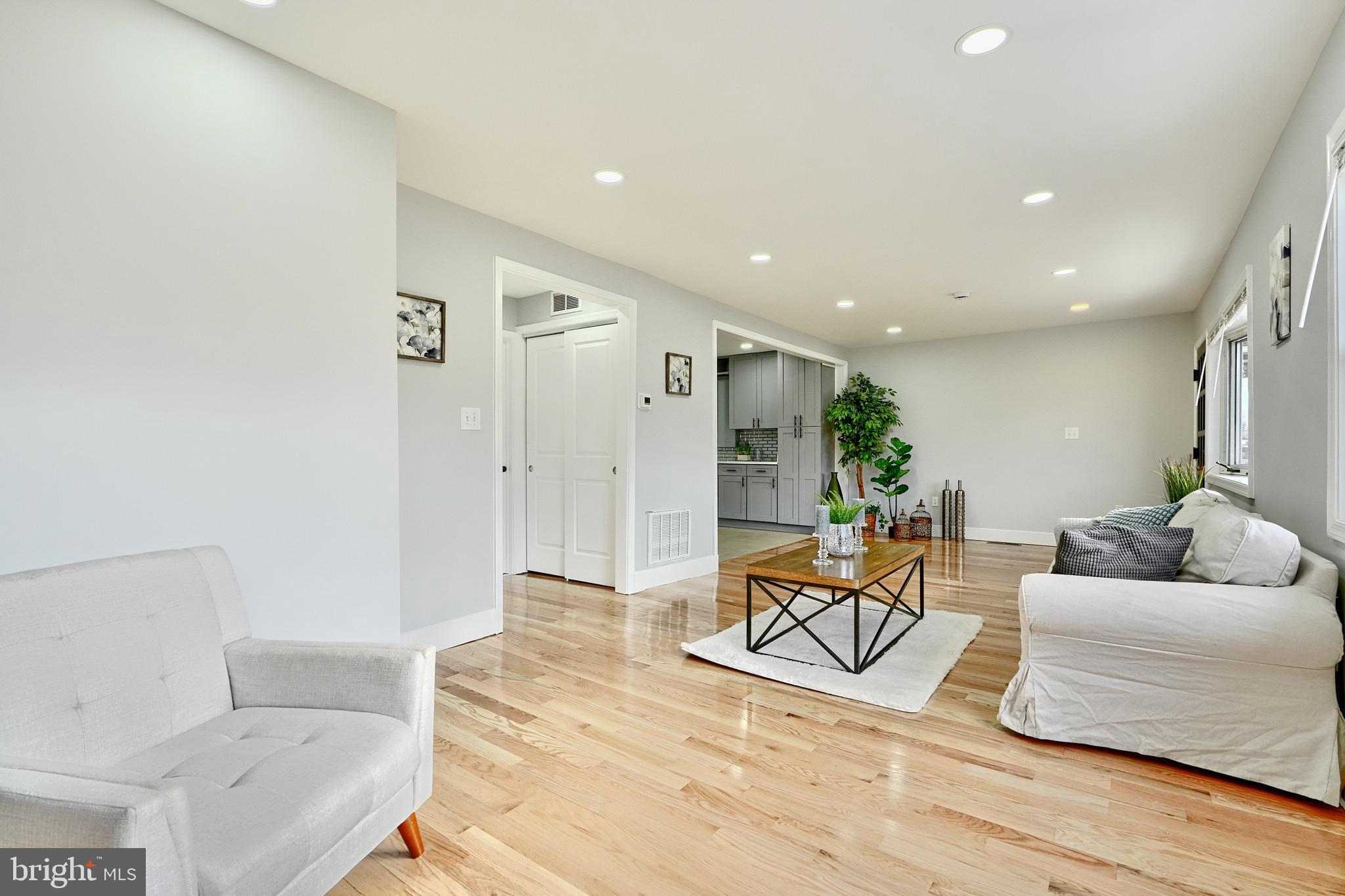 709 Fuselage Avenue Baltimore, MD 21221 - Photo 8 of 36 a living room with furniture and a couch