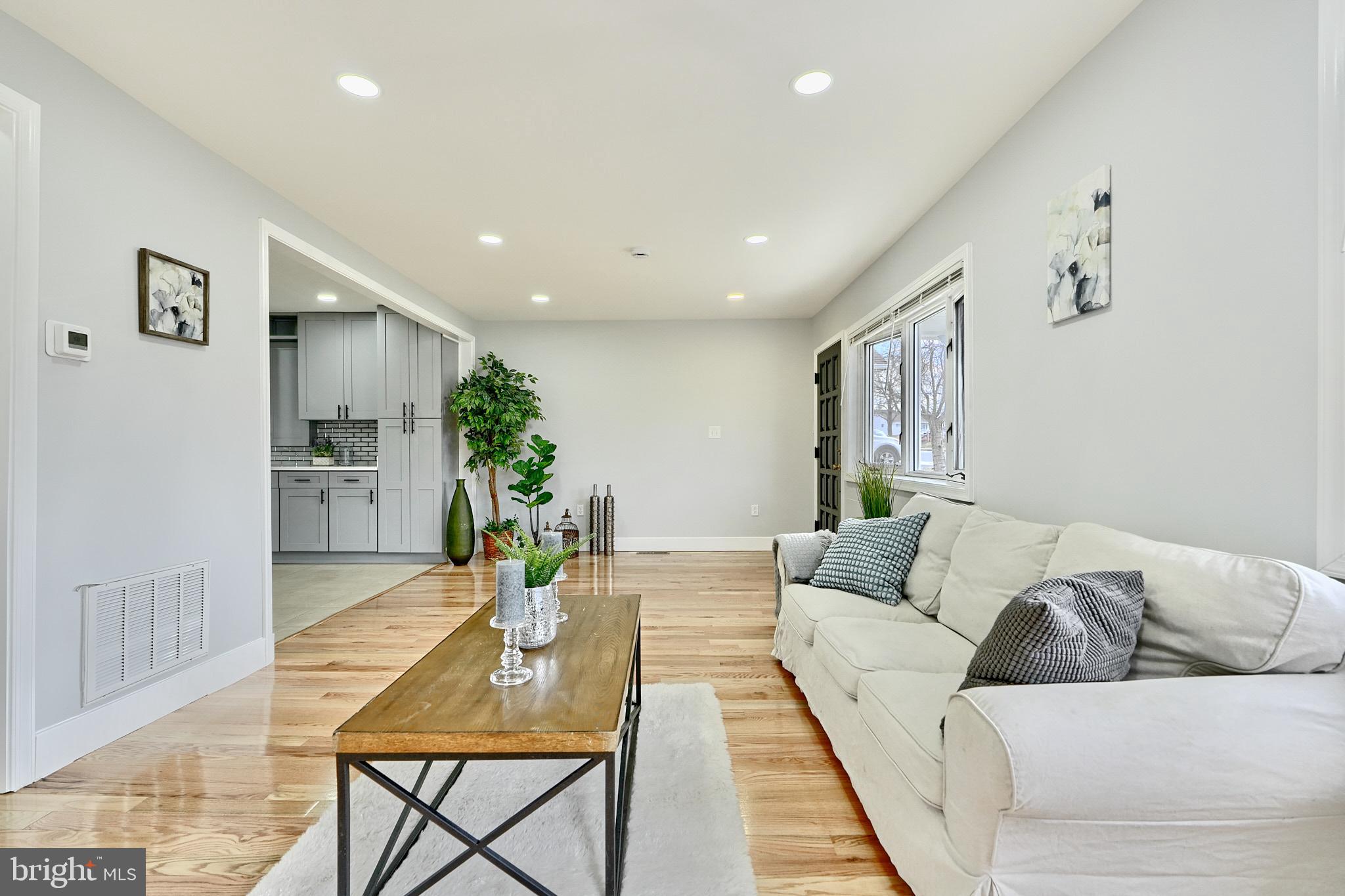 709 Fuselage Avenue Baltimore, MD 21221 - Photo 9 of 36 a living room with furniture