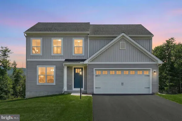 a front view of house with yard