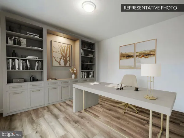 a view of a workspace with furniture