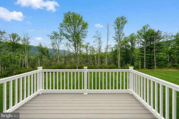 a view of a wooden roof deck
