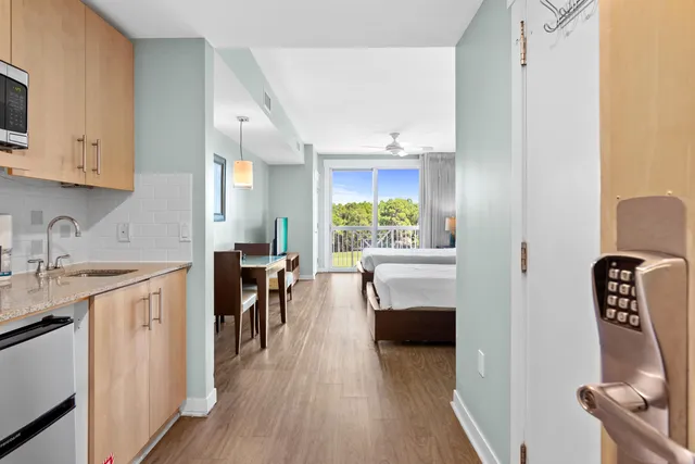 a view of living room with furniture and flat screen tv