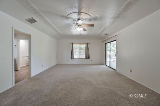 1257 Carolyn Street Ridgecrest, CA 93555 - Photo 24 of 42 a view of an empty room with a window