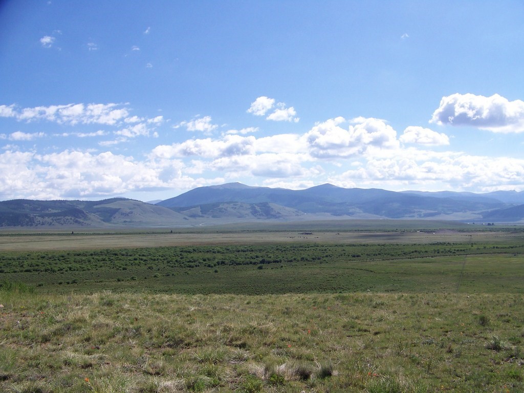 1327 Michigan Hill Road Jefferson, CO 80456 - Photo 2 of 11 a view of a lake with a mountain