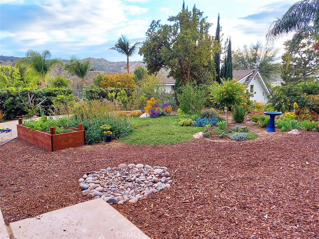3921 Declaration Avenue Calabasas, CA 91302 - Photo 18 of 26 a view of a street with a houses