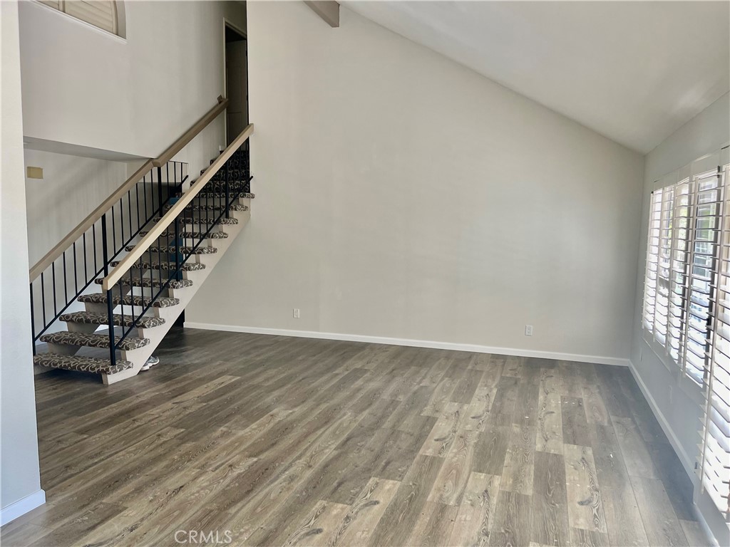 3921 Declaration Avenue Calabasas, CA 91302 - Photo 3 of 26 a view of wooden floor and windows in a room