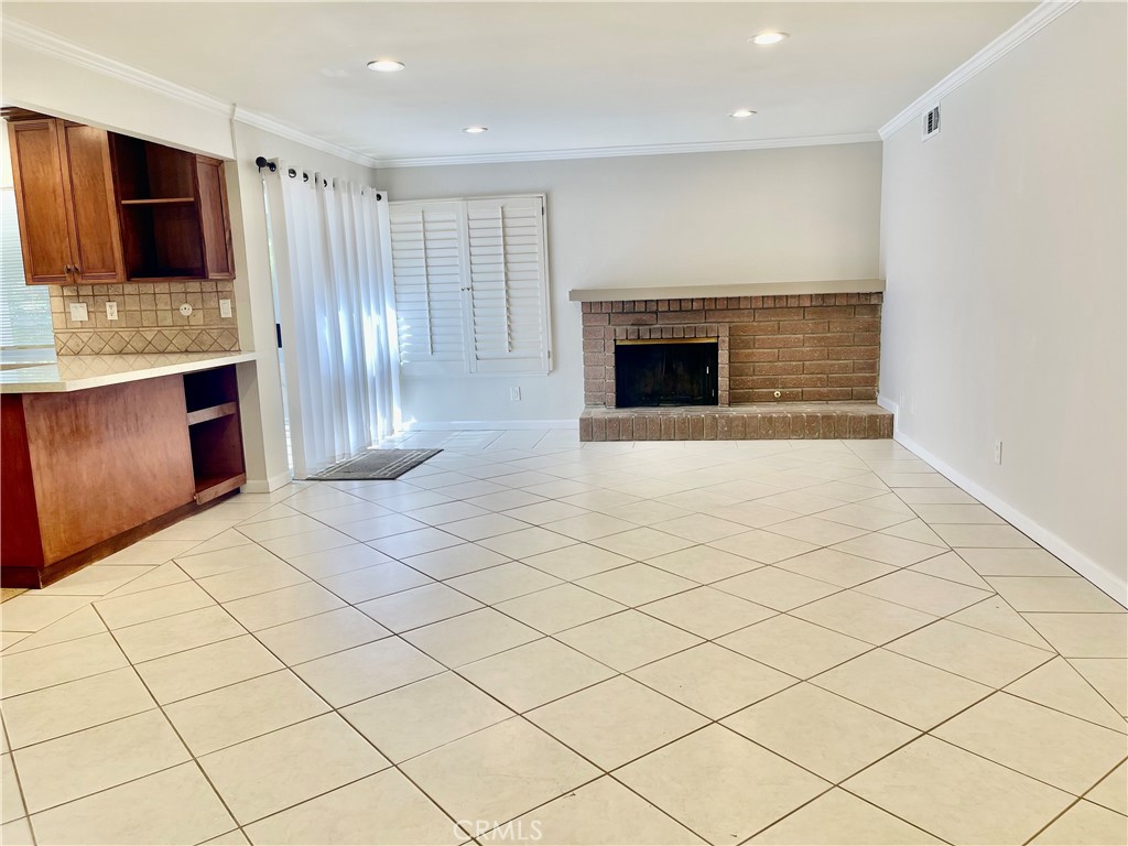 3921 Declaration Avenue Calabasas, CA 91302 - Photo 8 of 26 a kitchen with stainless steel appliances a sink and a stove top oven