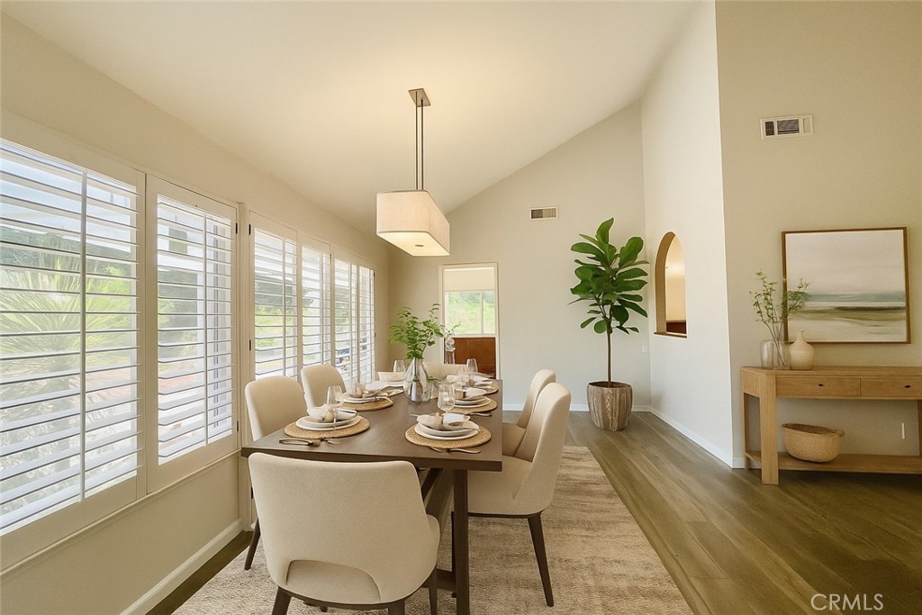 3921 Declaration Avenue Calabasas, CA 91302 - Photo 9 of 26 a view of a dining room with furniture window and outside view
