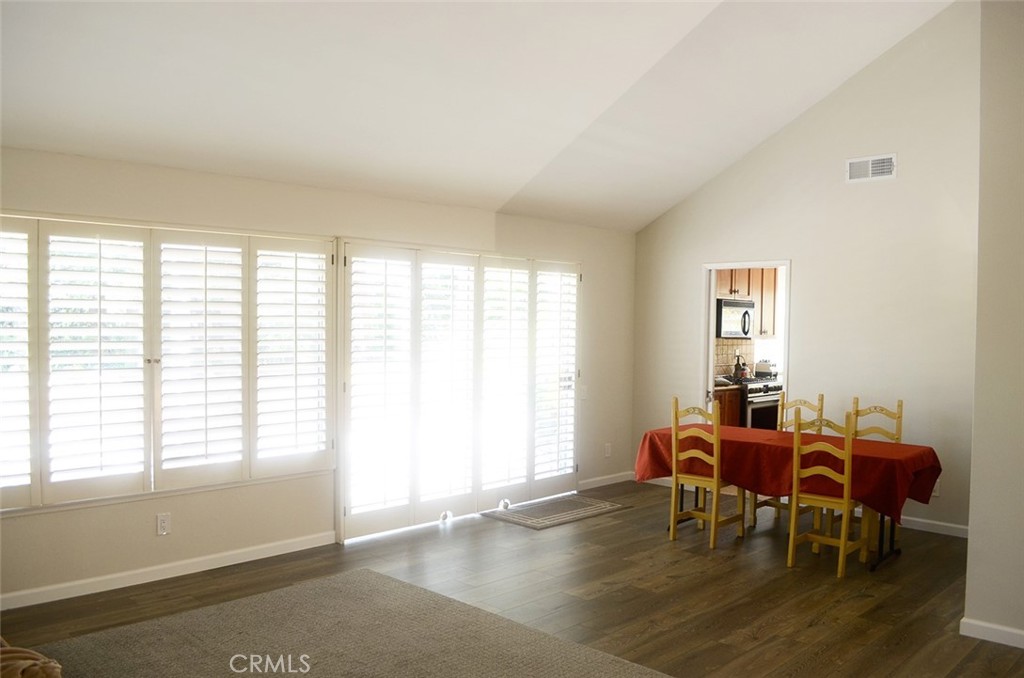 3921 Declaration Avenue Calabasas, CA 91302 - Photo 10 of 26 a view of a dining room with furniture and chandelier