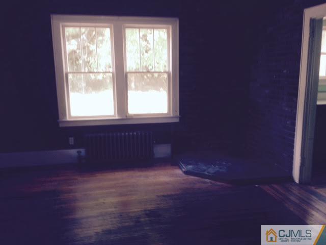 1563 Englishtown Road Old Bridge, NJ 08857 - Photo 11 of 15 an empty room with a window