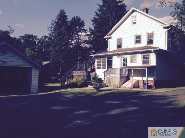 1563 Englishtown Road Old Bridge, NJ 08857 - Photo 13 of 15 a view of a house with a patio