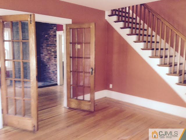 1563 Englishtown Road Old Bridge, NJ 08857 - Photo 7 of 15 a view of entryway with wooden floor