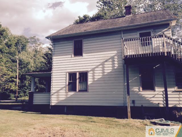 1563 Englishtown Road Old Bridge, NJ 08857 - Photo 10 of 15 a view of a house with a patio