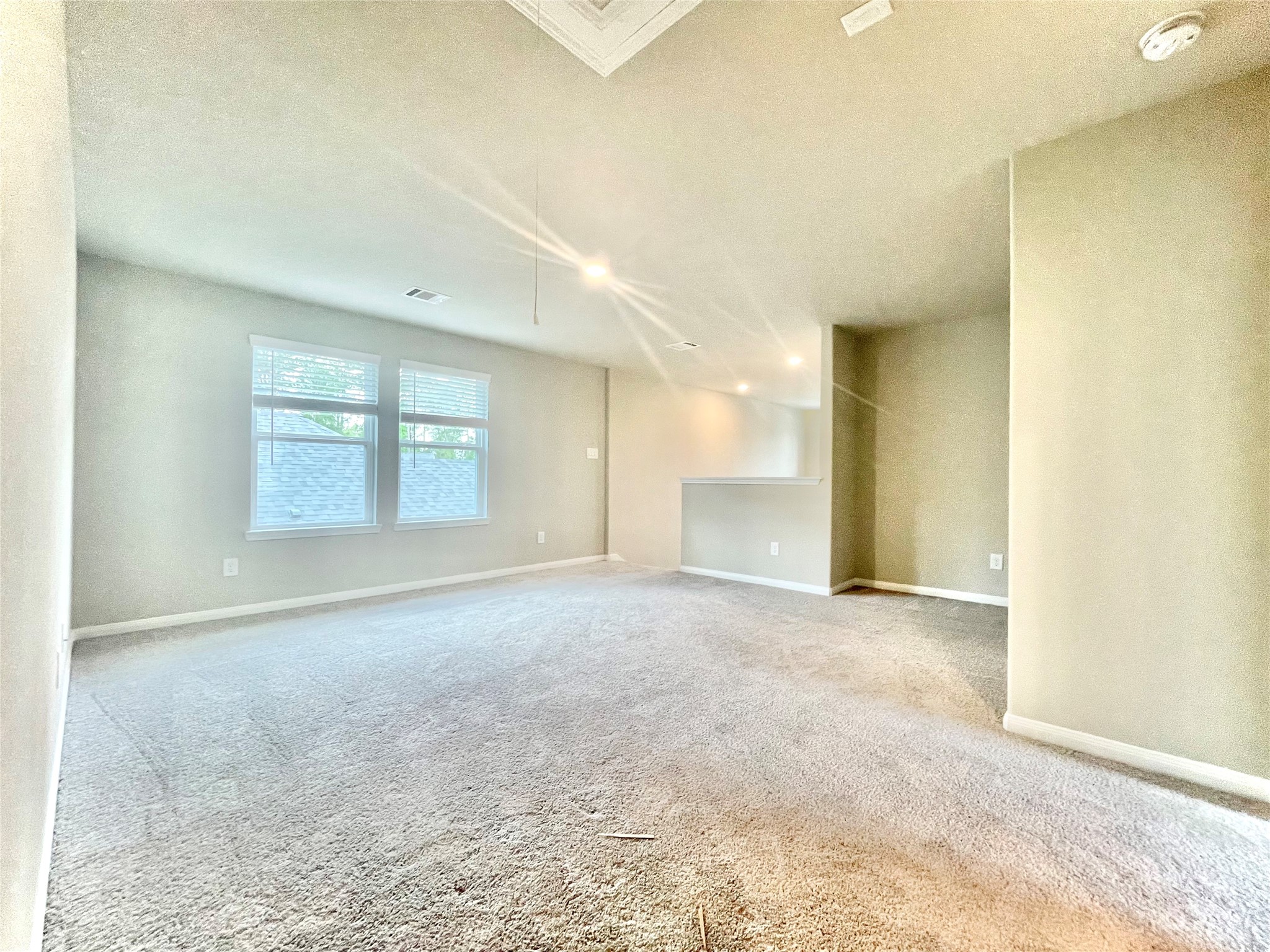 17526 Rosette Grass Conroe, TX 77385 - Photo 35 of 49 an empty room with a empty space and windows