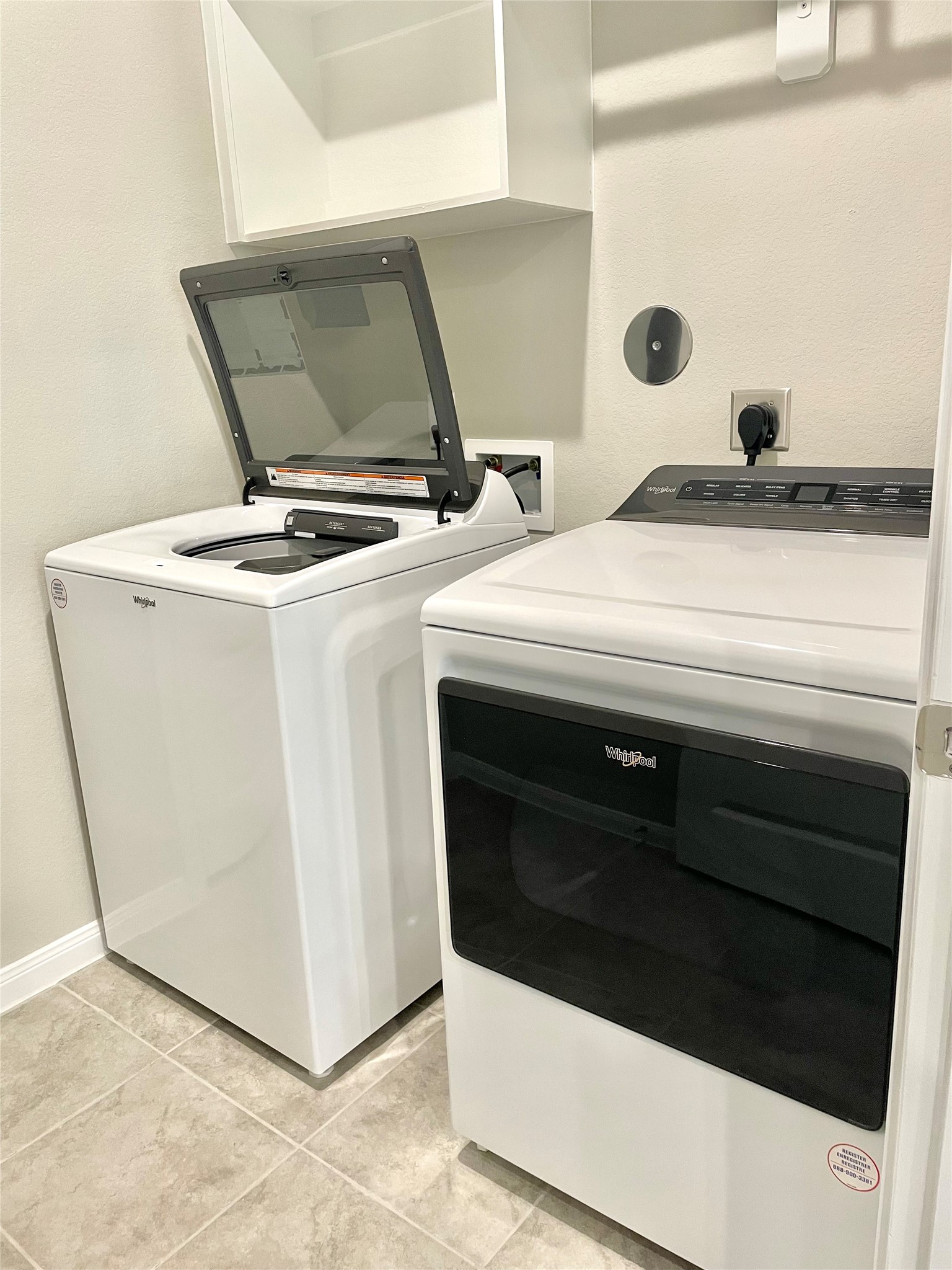 17526 Rosette Grass Conroe, TX 77385 - Photo 39 of 49 a utility room with washer and dryer