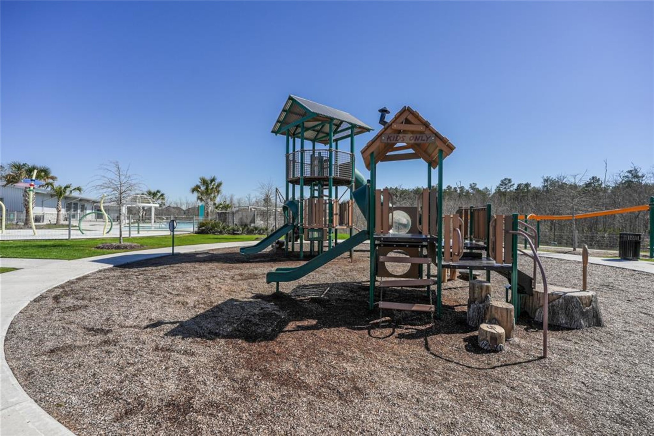 17526 Rosette Grass Conroe, TX 77385 - Photo 46 of 49 a view of a park with slide