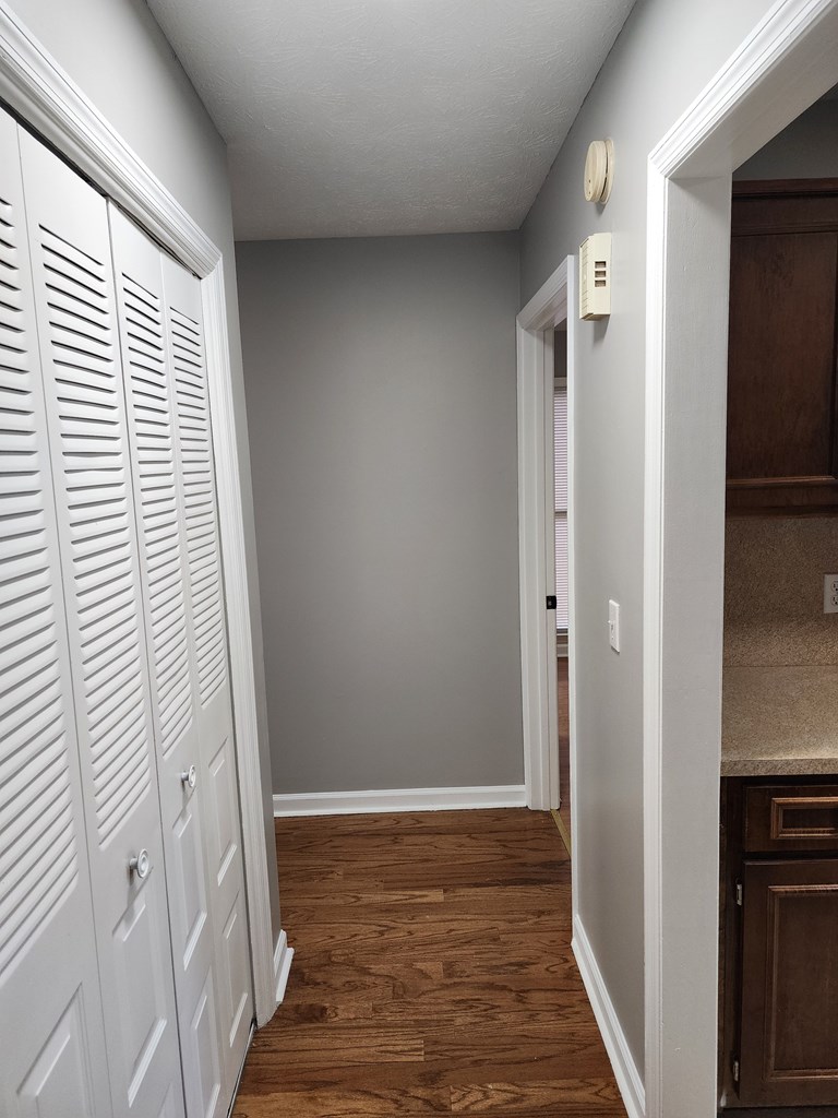 6 Maryland Court, Unit B Columbus, GA 31907 - Photo 10 of 15 a view of a hallway with wooden floor and staircase