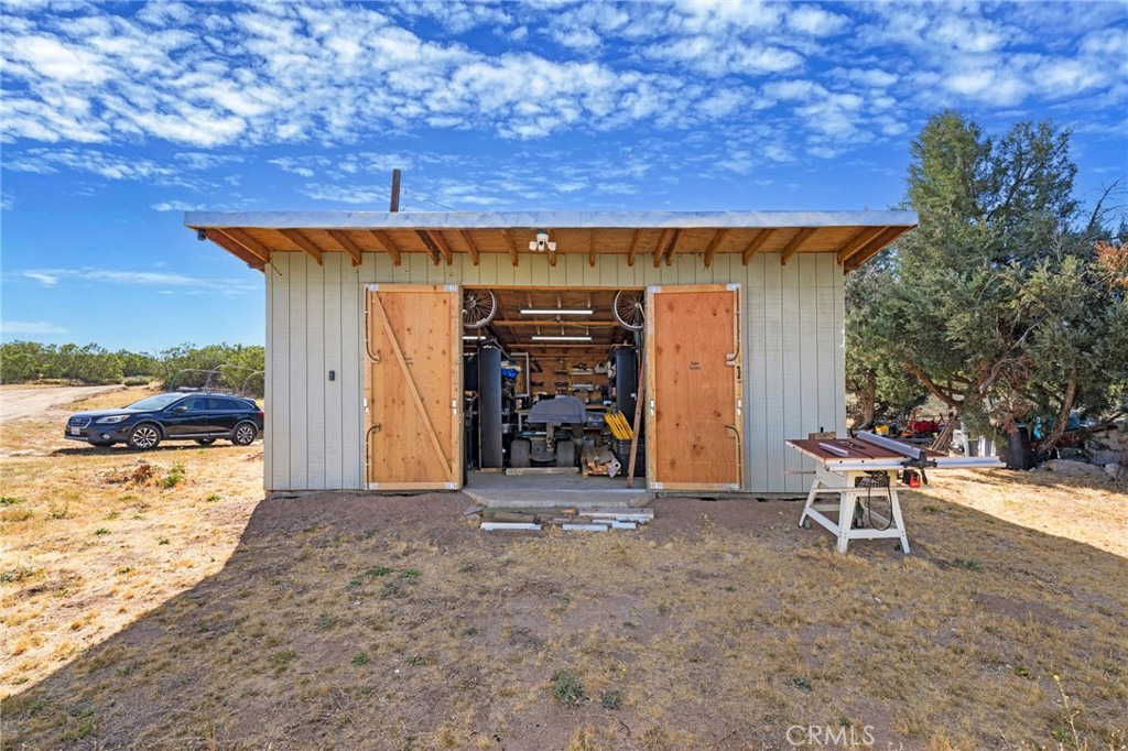 0 Springs Trail Anza, CA 92539 - Photo 20 of 40 a view of a chairs and table in the patio