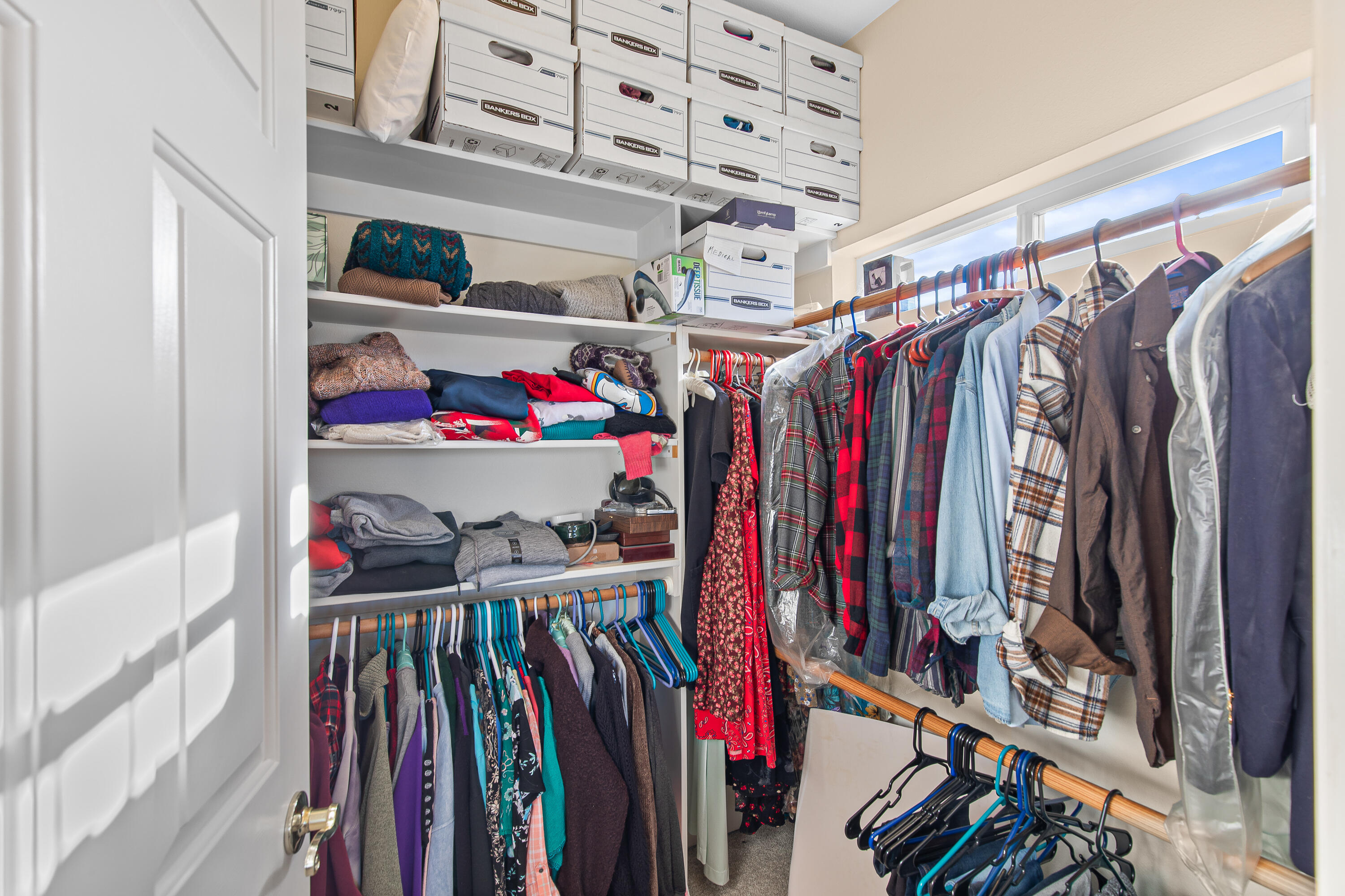 924 West Linn Road Eagle Point, OR 97524 - Photo 34 of 58 a view of walk in closet with clothes and shoes