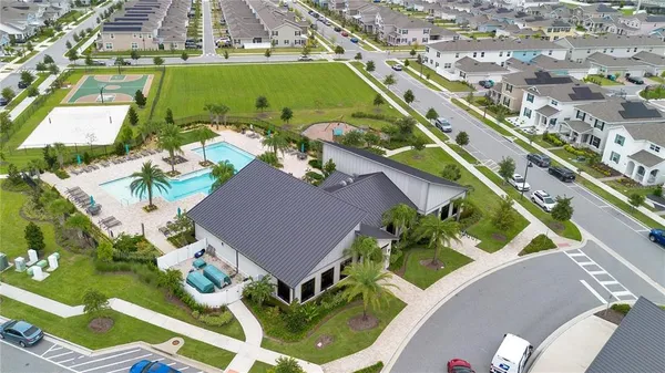 a view of a outdoor sitting area with chairs and umbrella