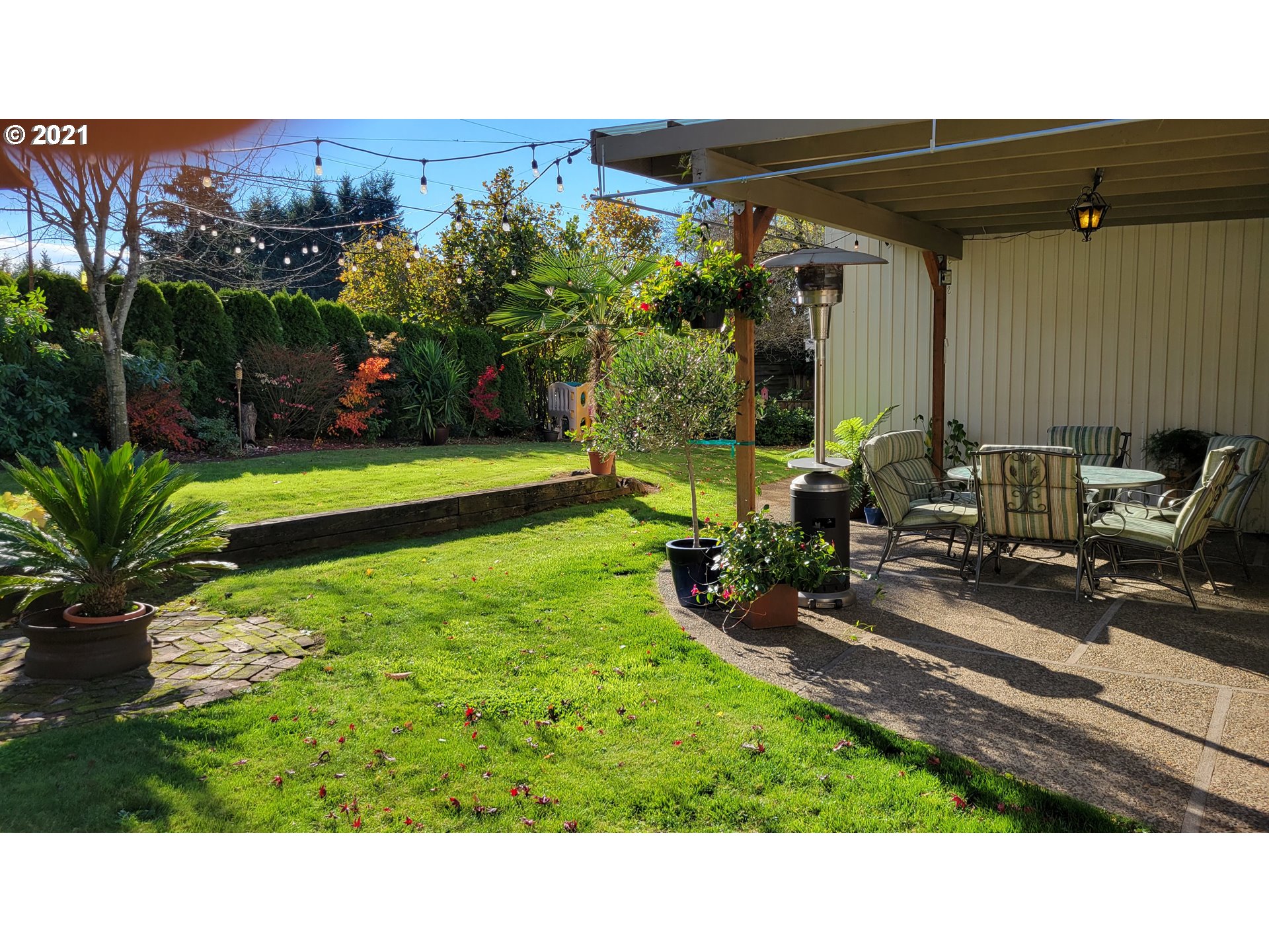 7622 Liberty Road South Salem, OR 97306 - Photo 27 of 32 a backyard of a house with table and chairs