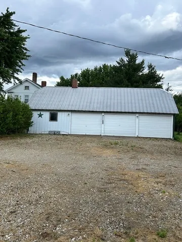 a view of outdoor space with wooden fence