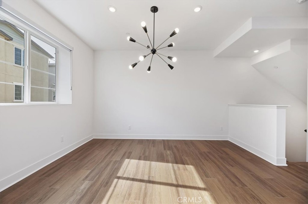 31680 Williams Way Rancho Mission Viejo, CA 92694 - Photo 7 of 20 wooden floor in an empty room with a window