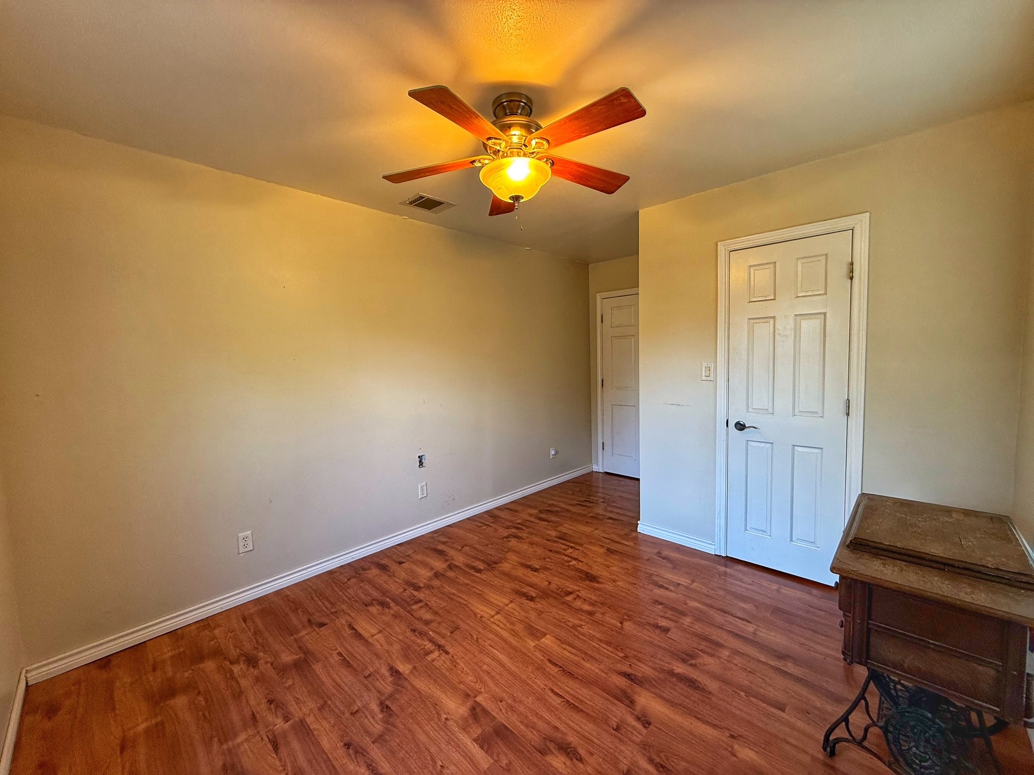 9496 Batson Road Normangee, TX 77871 - Photo 14 of 25 a view of an empty room and wooden floor