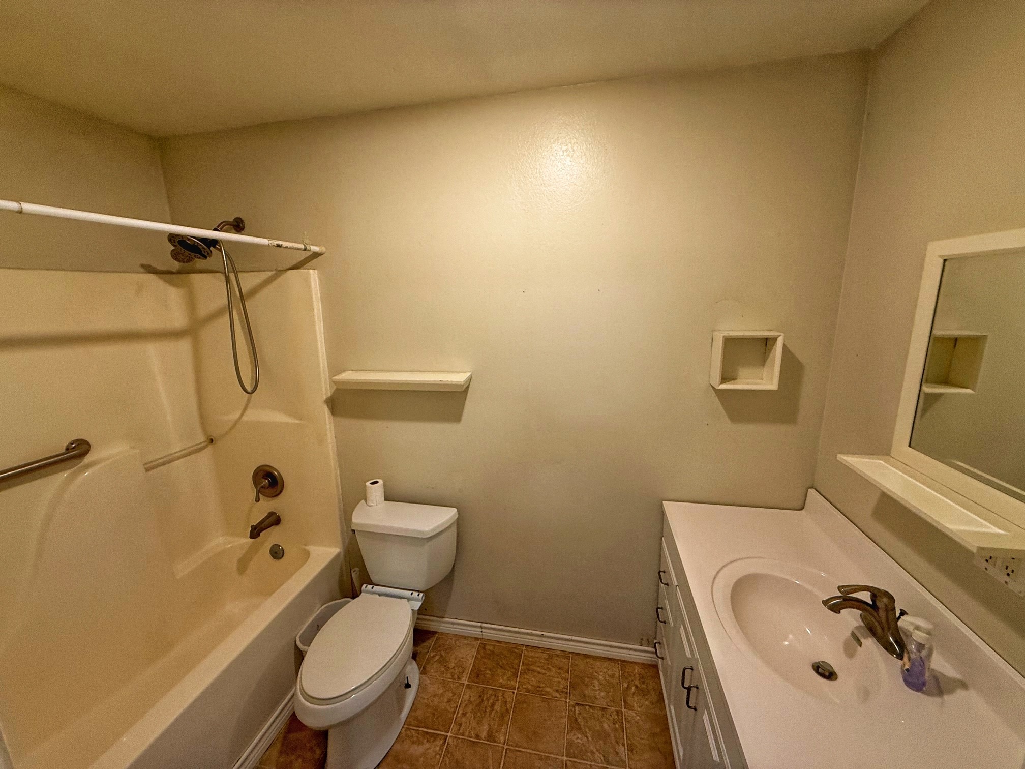 9496 Batson Road Normangee, TX 77871 - Photo 15 of 25 a bathroom with a sink toilet and shower
