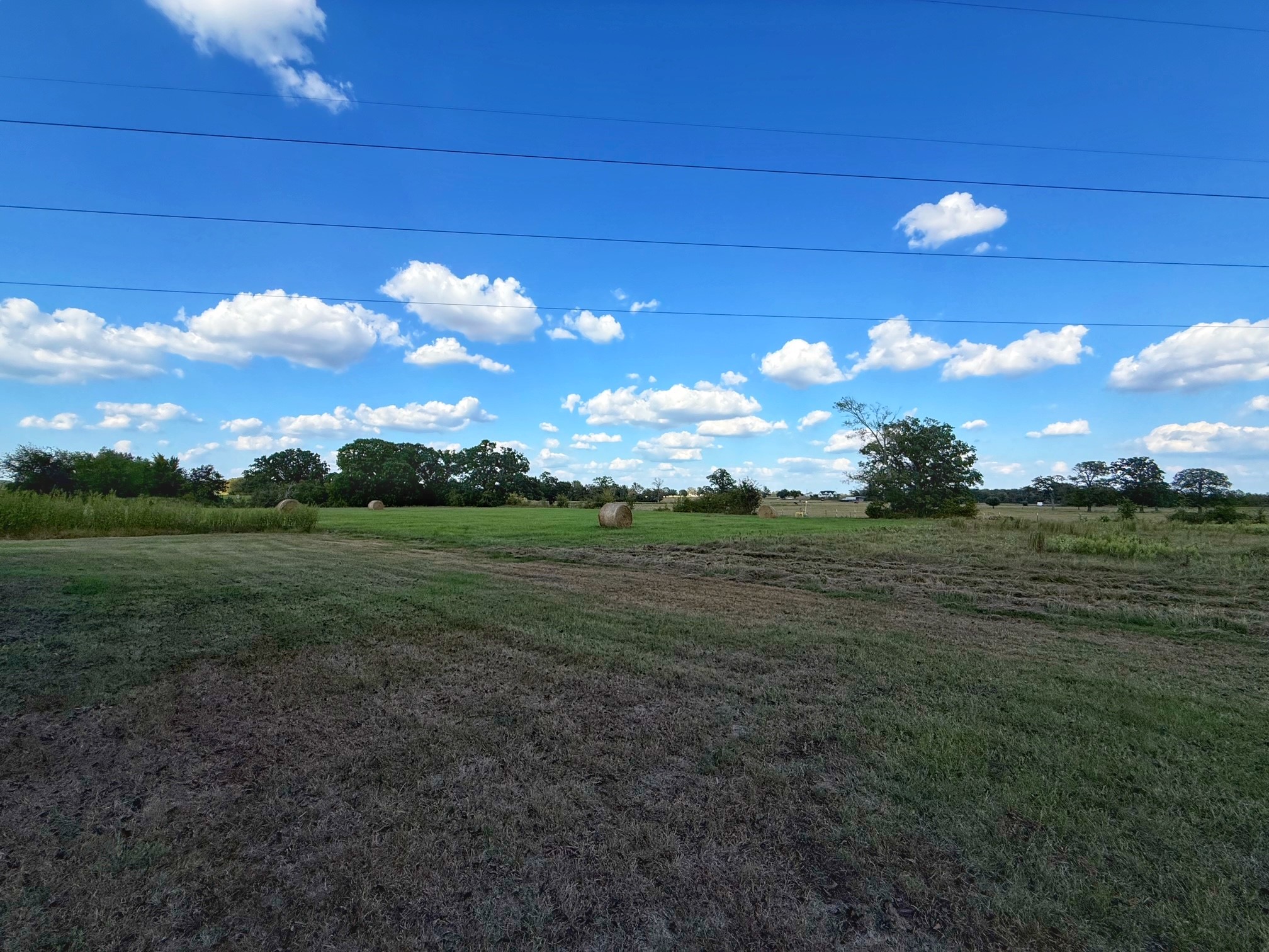9496 Batson Road Normangee, TX 77871 - Photo 20 of 25 a view of a golf course with a lake