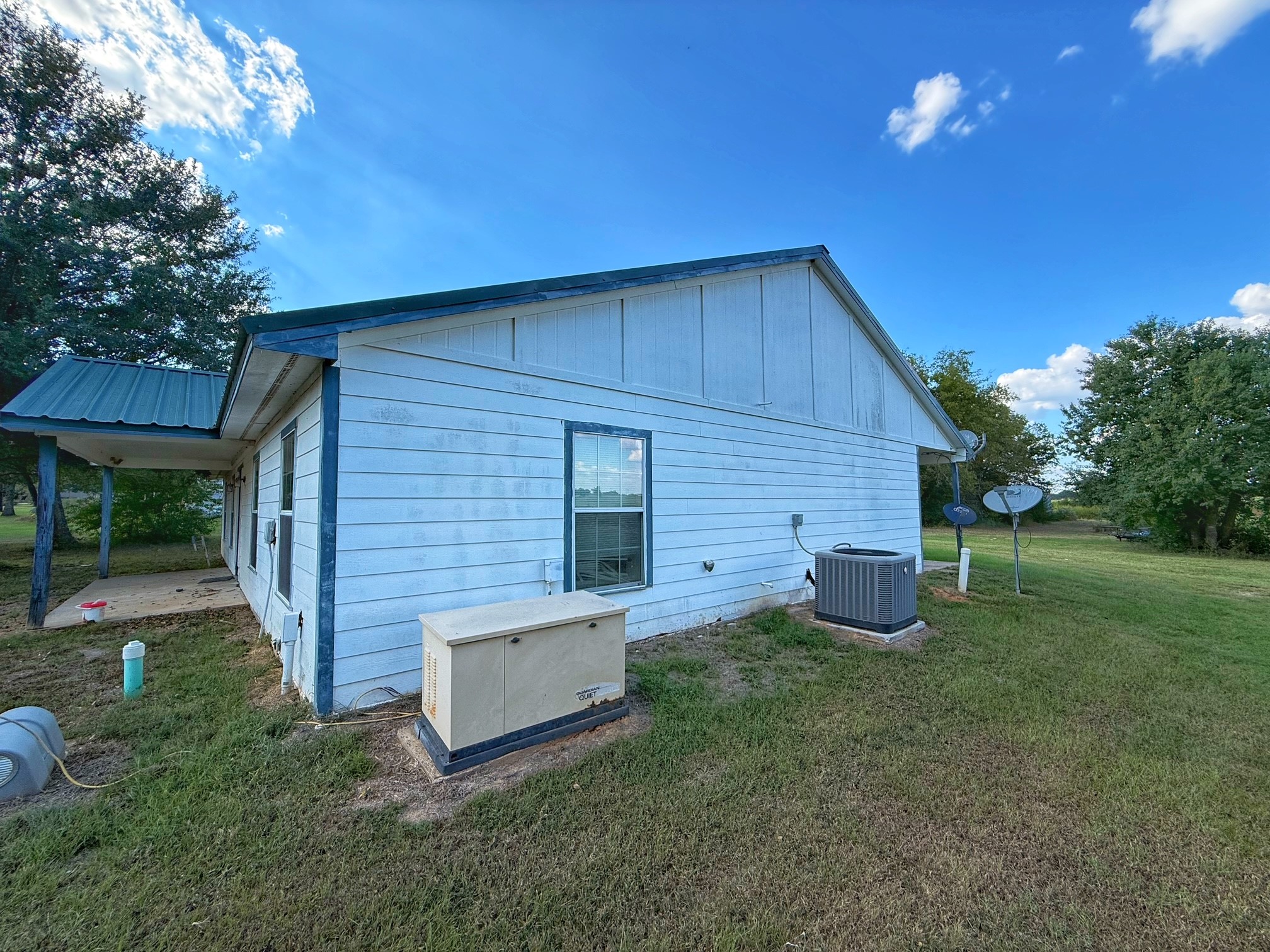 9496 Batson Road Normangee, TX 77871 - Photo 2 of 25 a view of a house with backyard